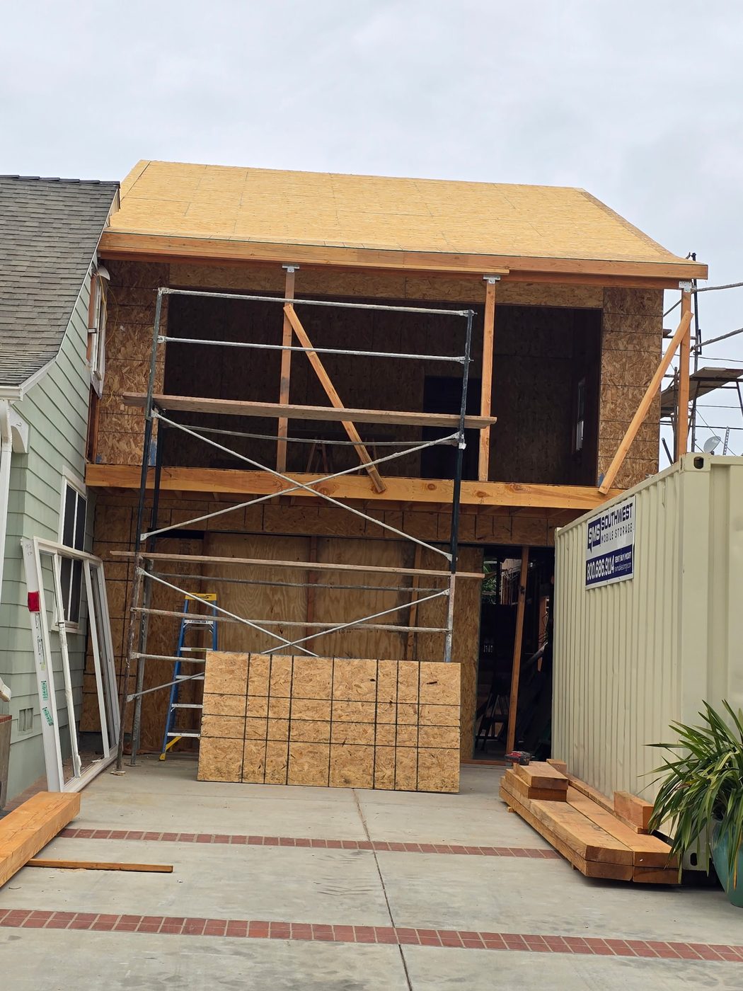 Second-story home addition under construction in San Diego — framing and sheathing in progress